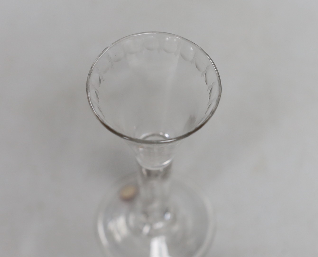 A Georgian hollow stem excise glass. 13cm tall